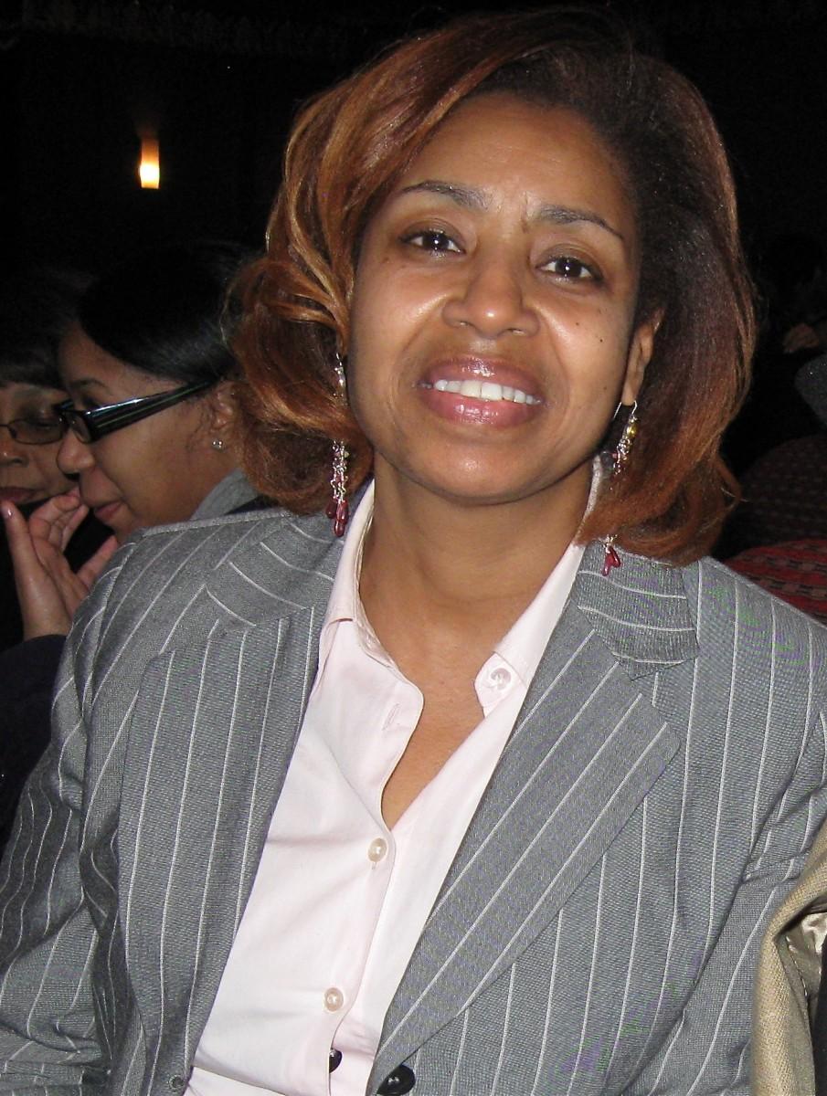 <a><img class="size-large wp-image-1791522" src="https://www.theepochtimes.com/assets/uploads/2015/09/20120219_St.Louis_Evening_Kerry+Huang_Janetta+Hill_Floral+Designer_DJY.jpg" alt="" width="267" height="354"/></a>