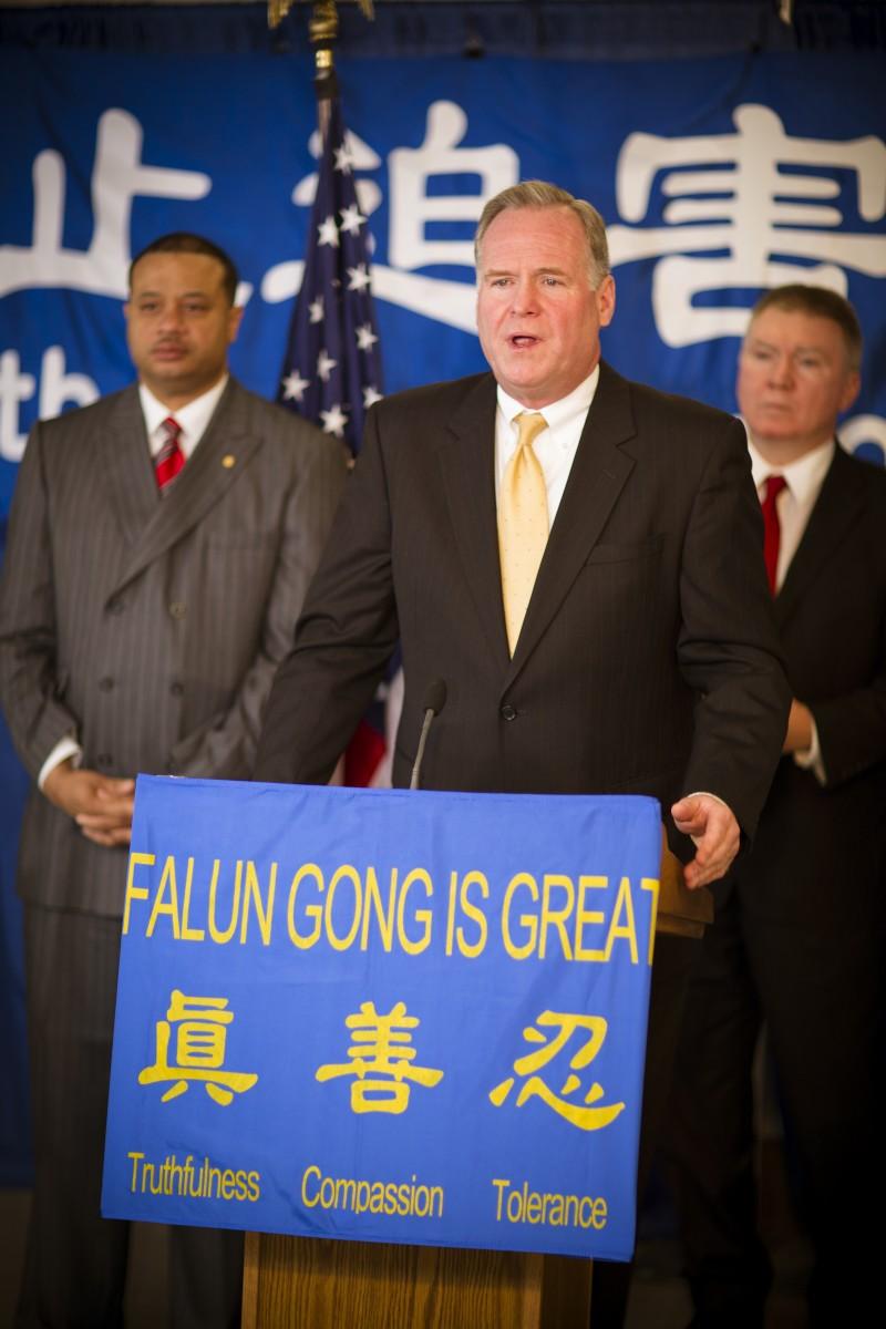 New York Assemblyman Michael J. Fitzpatrick speaks at a press conference supporting Falun Gong in Albany, NY on April 25, 2012. Assemblyman Eric A. Stevenson stands to his left and Assemblyman Mark Johns to his right. (Edward Dai/The Epoch Times)