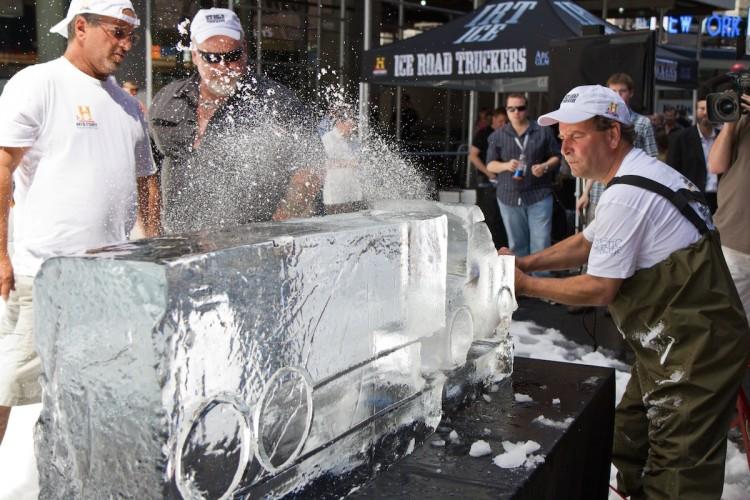 <a><img class="size-large wp-image-1786765" title="20120530_ice sculpture TMSQ_Chasteen_1" src="https://www.theepochtimes.com/assets/uploads/2015/09/20120530_ice-sculpture-TMSQ_Chasteen_1.jpg" alt="An ice sculptor creates a truck in a block of ice using a chainsaw in 80 degree weather right in the heart of Times Square Thursday. The demonstration was a marketing campaign for History Channel's "Ice Road Truckers." Star of the show, Hugh "Polar Bear" Rowland, looks on. (Benjamin Chasteen/The Epoch Times) " width="590" height="393"/></a>