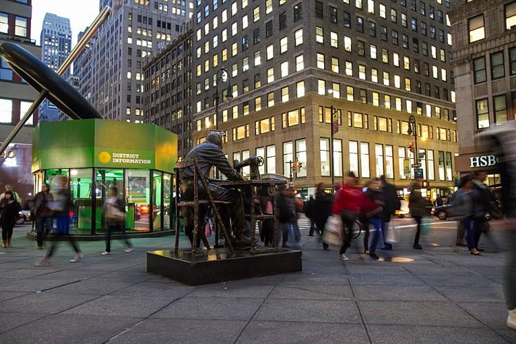 <a><img class="size-large wp-image-1775502" title=" The sculpture "The Garment Worker" by Judith Weller at the corner of 39th St. and 7th Ave. in the Garment District of Manhattan on Oct. 17. (Benjamin Chasteen/The Epoch Times) " src="https://www.theepochtimes.com/assets/uploads/2015/09/20121017Garment+District_BenC_8858.jpg" alt=" The sculpture "The Garment Worker" by Judith Weller at the corner of 39th St. and 7th Ave. in the Garment District of Manhattan on Oct. 17. (Benjamin Chasteen/The Epoch Times) " width="590" height="393"/></a>