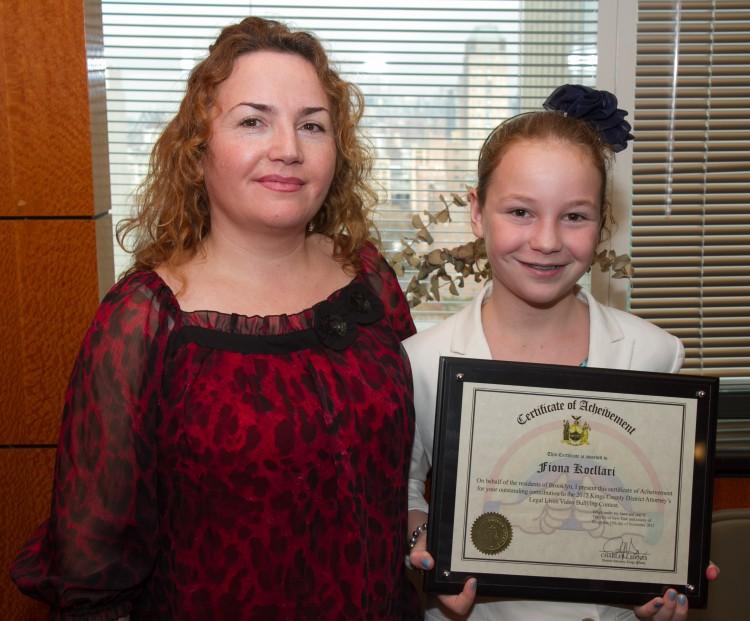 <a><img class=" wp-image-1774305" title=" Fiona Kocillari poses with her mother, Susanna, after winning the DA's 2012 anti-bullying video contest for a video he made with his classmates while in fifth grade on November 20. (Benjamin Chasteen/The Epoch Times) " src="https://www.theepochtimes.com/assets/uploads/2015/09/20121119Anti_bullying+_BenC_5548.jpg" alt=" Fiona Kocillari poses with her mother, Susanna, after winning the DA's 2012 anti-bullying video contest for a video he made with his classmates while in fifth grade on November 20. (Benjamin Chasteen/The Epoch Times) " width="304" height="252"/></a>