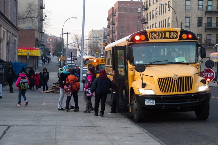 <a><img class="size-large wp-image-1772071" title="20130109School+Bus_BenC_2229- Students exit a school bus in front of their school in the Bronx on Jan. 9. (Benjamin Chasteen/The Epoch Times) " src="https://www.theepochtimes.com/assets/uploads/2015/09/20130109School+Bus_BenC_2229.jpg" alt=" Students exit a school bus in front of their school in the Bronx on Jan. 9. (Benjamin Chasteen/The Epoch Times) " width="590" height="393"/></a>