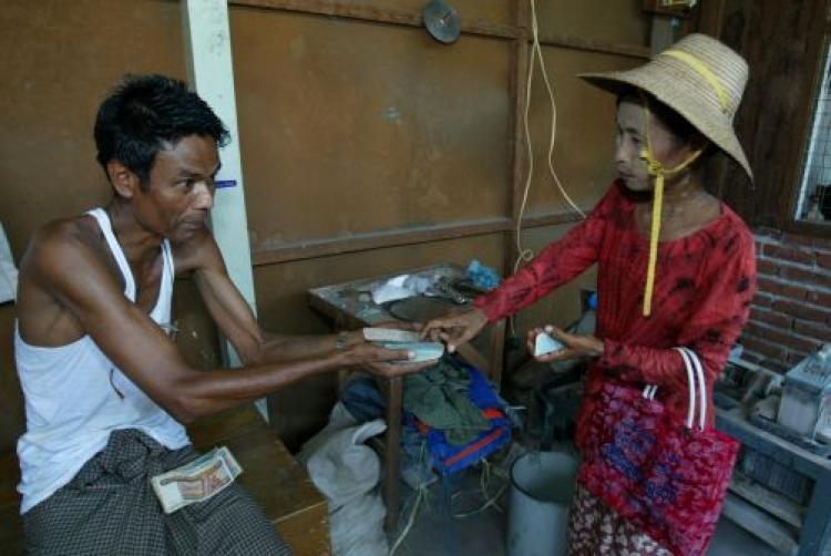 <a><img src="https://www.theepochtimes.com/assets/uploads/2015/09/2085888jade.jpg" alt="A Burmese woman deals her Jade stones with a shopkeeper at the Jade market June 15, 2003 in Mandalay, Myanmar. The country generates a considerable income from the mining of precious stones mostly from the northern part of Myanmar. It's a government run monopoly and all visitors must buy stones from licensed retail shops. (Paula Bronstein/Getty Images)" title="A Burmese woman deals her Jade stones with a shopkeeper at the Jade market June 15, 2003 in Mandalay, Myanmar. The country generates a considerable income from the mining of precious stones mostly from the northern part of Myanmar. It's a government run monopoly and all visitors must buy stones from licensed retail shops. (Paula Bronstein/Getty Images)" width="320" class="size-medium wp-image-1834148"/></a>