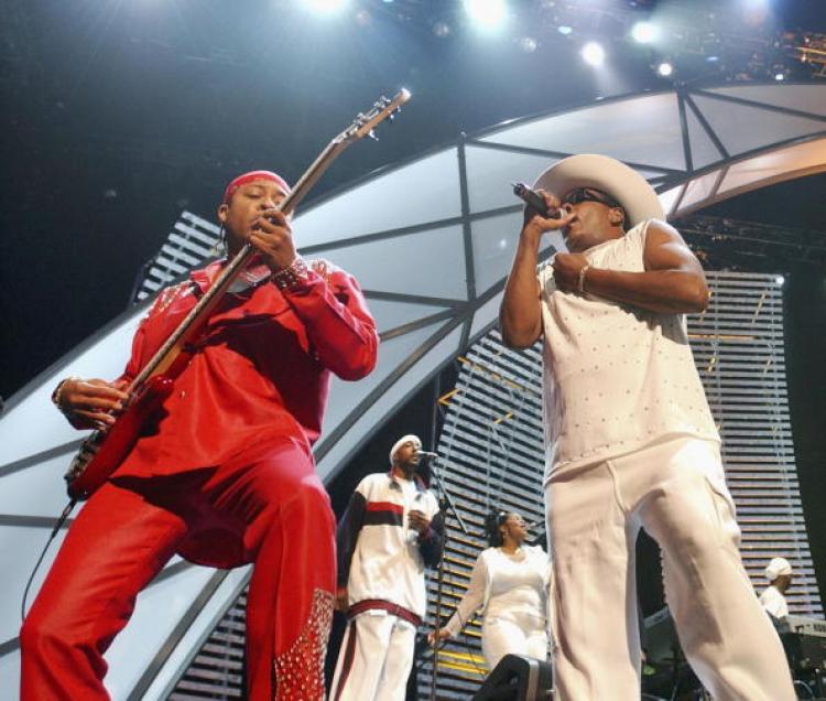 <a><img src="https://www.theepochtimes.com/assets/uploads/2015/09/2135761.jpg" alt="Robert Wilson, (L) and Charlie Wilson (R) of The Gap Band perform at the 2003 Essence Festival on July 3, 2003 in New Orleans, LO.  (Chris Graythen/Getty Images)" title="Robert Wilson, (L) and Charlie Wilson (R) of The Gap Band perform at the 2003 Essence Festival on July 3, 2003 in New Orleans, LO.  (Chris Graythen/Getty Images)" width="320" class="size-medium wp-image-1816047"/></a>