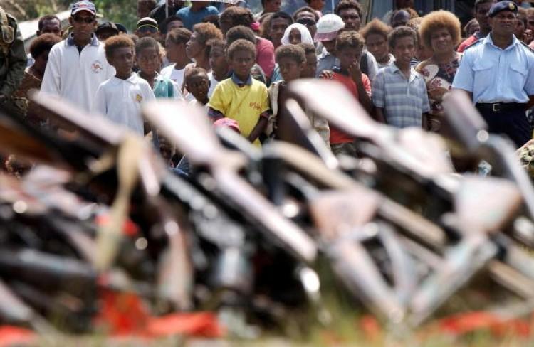 <a><img src="https://www.theepochtimes.com/assets/uploads/2015/09/2402168.jpg" alt="Locals look over the guns handed in to the Regional Assistance Mission to the Solomon Islands (RAMSI) in August 2003. Solomon Islands in 2011 is a very different place to that of 2003 says RAMSIs Deputy Special Coordinator, Mary Thurston. (Australian Defence Forces/AFP/Getty Images)" title="Locals look over the guns handed in to the Regional Assistance Mission to the Solomon Islands (RAMSI) in August 2003. Solomon Islands in 2011 is a very different place to that of 2003 says RAMSIs Deputy Special Coordinator, Mary Thurston. (Australian Defence Forces/AFP/Getty Images)" width="320" class="size-medium wp-image-1801424"/></a>