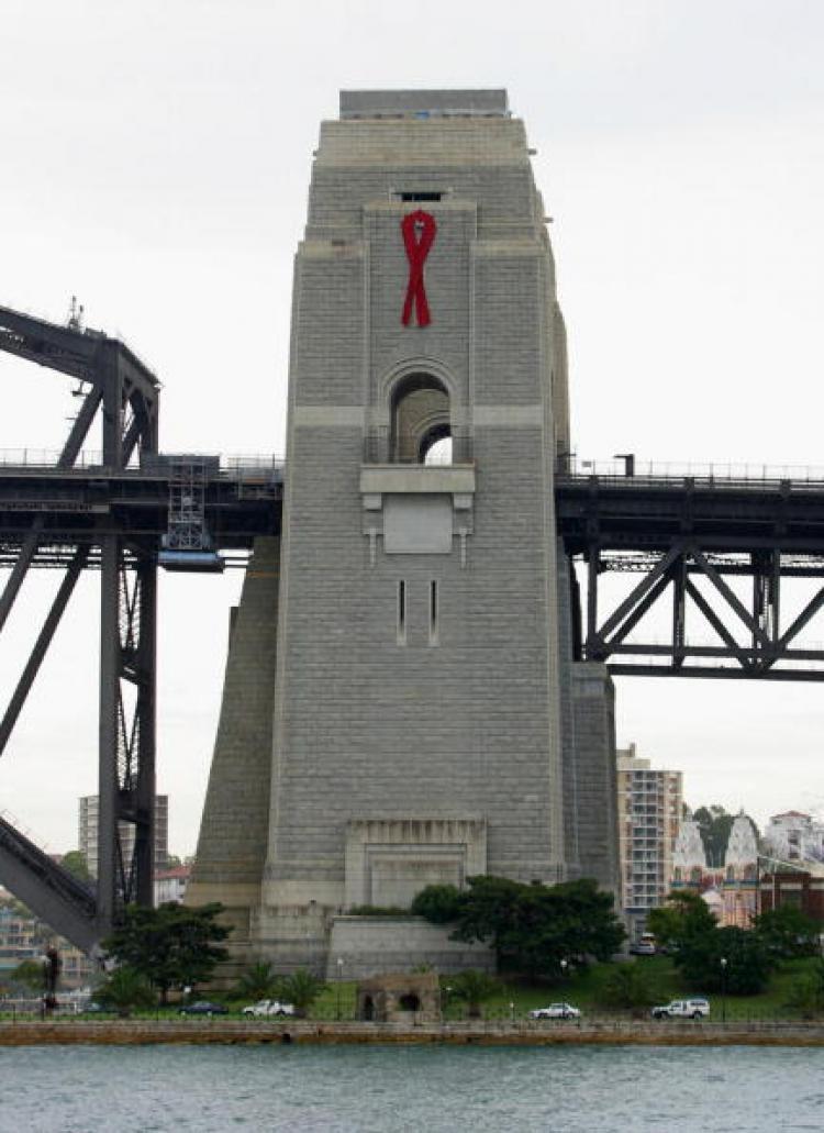 <a><img src="https://www.theepochtimes.com/assets/uploads/2015/09/2772593.jpg" alt="A ribbon to mark the anniversary of World Aids Day hangs from the northern pylon of the Sydney Harbour Bridge.  (David Hancock/AFP/Getty Images)" title="A ribbon to mark the anniversary of World Aids Day hangs from the northern pylon of the Sydney Harbour Bridge.  (David Hancock/AFP/Getty Images)" width="320" class="size-medium wp-image-1811426"/></a>