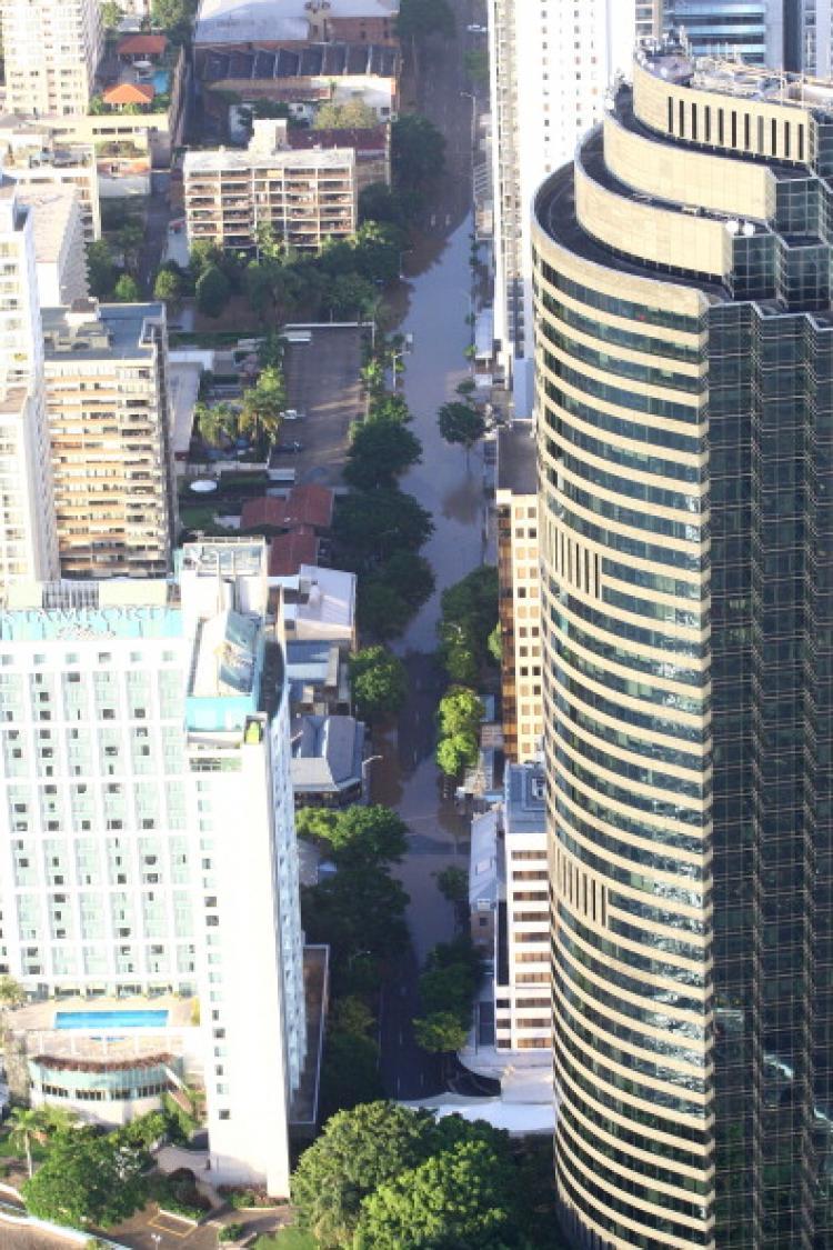 <a><img src="https://www.theepochtimes.com/assets/uploads/2015/09/2_108009254.jpg" alt="An aerial view of a flooded street in the Brisbane CBD on January 13, 2011 in Brisbane, Queensland's capital city. (Jonathan Wood/Getty Images)" title="An aerial view of a flooded street in the Brisbane CBD on January 13, 2011 in Brisbane, Queensland's capital city. (Jonathan Wood/Getty Images)" width="320" class="size-medium wp-image-1809761"/></a>