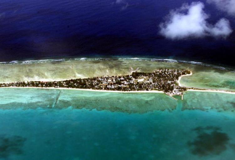 <a><img src="https://www.theepochtimes.com/assets/uploads/2015/09/51342856.jpg" alt="There is not much room to retreat from rising sea levels on Tarawa atoll, capital of the vast archipelago nation of Kiribati. (Torsten Blackwood/AFP/Getty Images)" title="There is not much room to retreat from rising sea levels on Tarawa atoll, capital of the vast archipelago nation of Kiribati. (Torsten Blackwood/AFP/Getty Images)" width="320" class="size-medium wp-image-1830099"/></a>