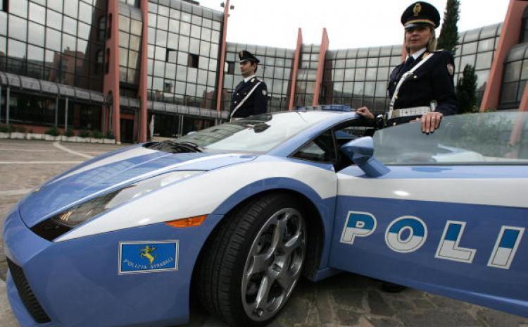 <a><img src="https://www.theepochtimes.com/assets/uploads/2015/09/51884318.jpg" alt="Two Italian police officers showcase the 'Lamborghini Gallardo' police care in Rome on 16 Dec. 2004.  (PATRICK HERTZOG/AFP/Getty Images)" title="Two Italian police officers showcase the 'Lamborghini Gallardo' police care in Rome on 16 Dec. 2004.  (PATRICK HERTZOG/AFP/Getty Images)" width="320" class="size-medium wp-image-1824965"/></a>