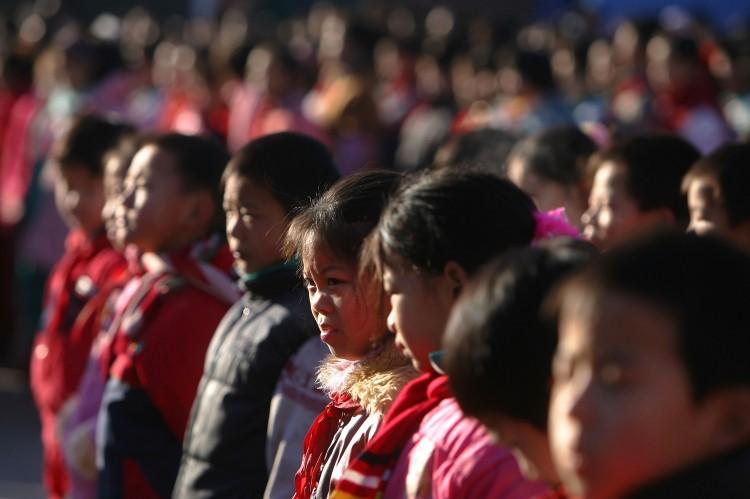 <a><img src="https://www.theepochtimes.com/assets/uploads/2015/09/51899717.jpg" alt="BEIJING, CHINA - DECEMBER 28: Students gather on the playground at Xingzhi Primary School, one of the largest migrant children's schools, on December 28, 2004 in Beijing, China.  (Photo by Cancan Chu/Getty Images)" title="BEIJING, CHINA - DECEMBER 28: Students gather on the playground at Xingzhi Primary School, one of the largest migrant children's schools, on December 28, 2004 in Beijing, China.  (Photo by Cancan Chu/Getty Images)" width="320" class="size-medium wp-image-1801314"/></a>