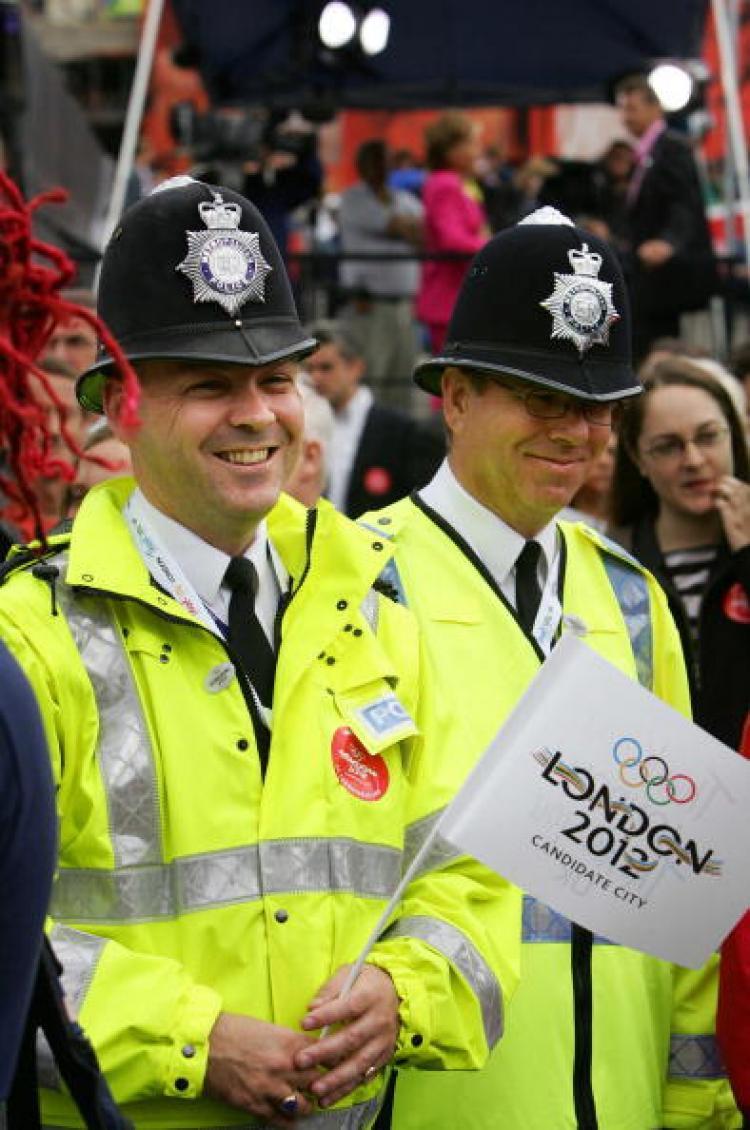 <a><img src="https://www.theepochtimes.com/assets/uploads/2015/09/53202138.jpg" alt="London bobbies show their support for London's bid for the 2012 Olympic Games in London's Trafalgar Square, 06 July, 2005. . (ADRIAN DENNIS/AFP/Getty Images)" title="London bobbies show their support for London's bid for the 2012 Olympic Games in London's Trafalgar Square, 06 July, 2005. . (ADRIAN DENNIS/AFP/Getty Images)" width="320" class="size-medium wp-image-1817832"/></a>