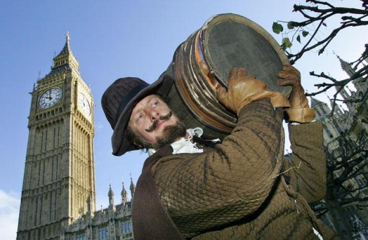 <a><img src="https://www.theepochtimes.com/assets/uploads/2015/09/56040533.jpg" alt="An actor (Bill Hurst) dressed as Guy Fawkes carries a fake barrel of gunpowder into the Houses of Parliament in London.  (Odd Anderesen/AFP/Getty Images)" title="An actor (Bill Hurst) dressed as Guy Fawkes carries a fake barrel of gunpowder into the Houses of Parliament in London.  (Odd Anderesen/AFP/Getty Images)" width="320" class="size-medium wp-image-1812488"/></a>