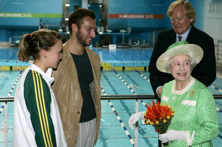 <a><img src="https://www.theepochtimes.com/assets/uploads/2015/09/57101950.jpg" alt="Queen Elizabeth II chats with Australian swimmers Kylie Palmer (L) and Ian Thorpe (2nd L) as Ron Walker, chairman of the Commonwealth Games Corp., looks on. The Queen, who was in Australia on a five-day visit, opened the 18th Commonwealth Games on March 1, 2006. (Rick Rycroft-Pool/Getty Images)" title="Queen Elizabeth II chats with Australian swimmers Kylie Palmer (L) and Ian Thorpe (2nd L) as Ron Walker, chairman of the Commonwealth Games Corp., looks on. The Queen, who was in Australia on a five-day visit, opened the 18th Commonwealth Games on March 1, 2006. (Rick Rycroft-Pool/Getty Images)" width="320" class="size-medium wp-image-1815413"/></a>
