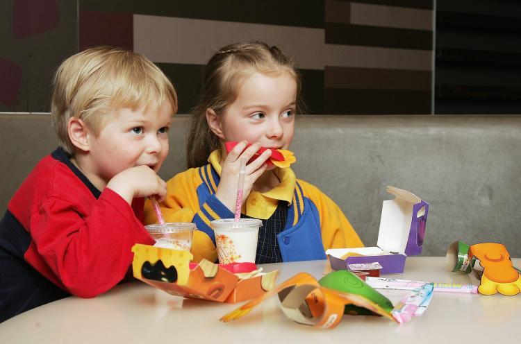 <a><img src="https://www.theepochtimes.com/assets/uploads/2015/09/71737746.jpg" alt="Children eat a Happy Meal at a McDonald's restaurant. Officials in Santa Clara County, Calif. this week have banned high-Cal children's fast-food meals that come with toy promotions. (Kristian Dowling/Getty Images)" title="Children eat a Happy Meal at a McDonald's restaurant. Officials in Santa Clara County, Calif. this week have banned high-Cal children's fast-food meals that come with toy promotions. (Kristian Dowling/Getty Images)" width="320" class="size-medium wp-image-1820516"/></a>