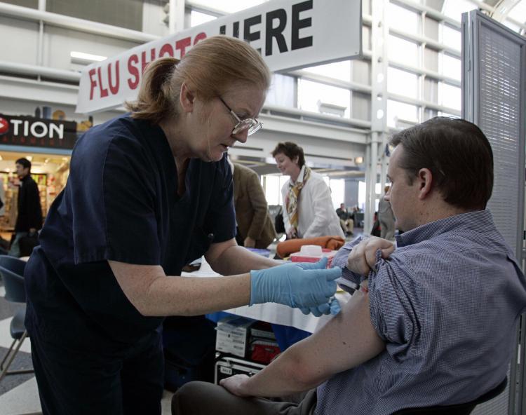 <a><img src="https://www.theepochtimes.com/assets/uploads/2015/09/72613380.jpg" alt="A Chicago man gets a flu shot from a nurse in the United Terminal in  2006 at O'Hare Airport in Chicago, Illinois. (Jeff Haynes/AFP/Getty Images)" title="A Chicago man gets a flu shot from a nurse in the United Terminal in  2006 at O'Hare Airport in Chicago, Illinois. (Jeff Haynes/AFP/Getty Images)" width="320" class="size-medium wp-image-1810210"/></a>