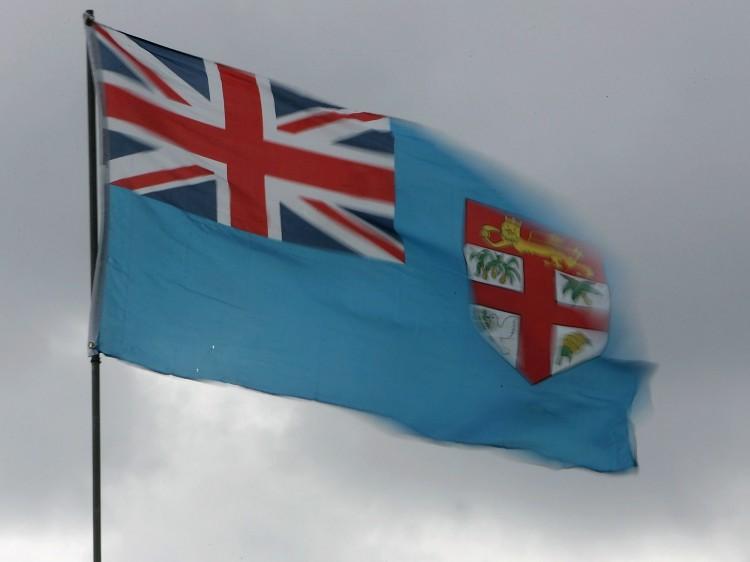 <a><img class="size-large wp-image-1784193" title="72758578" src="https://www.theepochtimes.com/assets/uploads/2015/09/72758578.jpg" alt=" The Fijian flag" width="590" height="442"/></a>