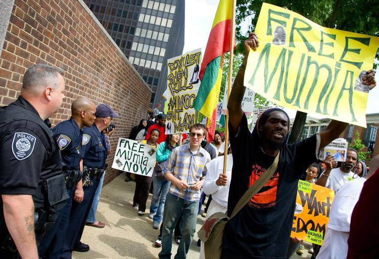 <a><img src="https://www.theepochtimes.com/assets/uploads/2015/09/74177203-Mumia.jpg" alt="File photo of supporters for death row inmate Mumia Abu-Jamal rallying outside the Federal Court building May 17, 2007 in Philadelphia, Pennsylvania.Today the federal appeals court ruled that death-row inmate Mumia Abu-Jamal should get a new sentencing hearing, according to Reuters. (Jeff Fusco/Getty Images)" title="File photo of supporters for death row inmate Mumia Abu-Jamal rallying outside the Federal Court building May 17, 2007 in Philadelphia, Pennsylvania.Today the federal appeals court ruled that death-row inmate Mumia Abu-Jamal should get a new sentencing hearing, according to Reuters. (Jeff Fusco/Getty Images)" width="320" class="size-medium wp-image-1804915"/></a>