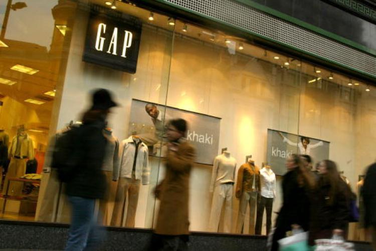 <a><img src="https://www.theepochtimes.com/assets/uploads/2015/09/754577.jpg" alt="People walk past a Gap store on Oxford Street in London. The Gap Inc. is looking up lately as the company increasingly leverages social and environmental awareness programs to appeal to its young and progressive clientele. (Sion Touhig/Getty Images)" title="People walk past a Gap store on Oxford Street in London. The Gap Inc. is looking up lately as the company increasingly leverages social and environmental awareness programs to appeal to its young and progressive clientele. (Sion Touhig/Getty Images)" width="320" class="size-medium wp-image-1820374"/></a>