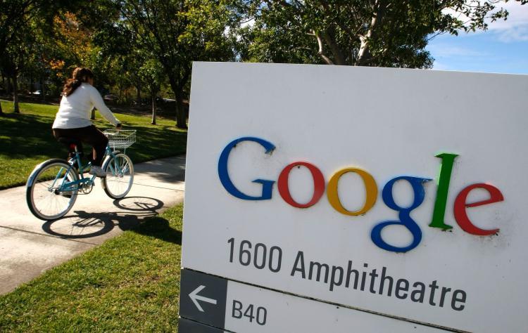 <a><img src="https://www.theepochtimes.com/assets/uploads/2015/09/77402286Google.jpg" alt="A Google employee rides a bicycle at the company's headquarters in Mountain View, California. (Justin Sullivan/Getty Images)" title="A Google employee rides a bicycle at the company's headquarters in Mountain View, California. (Justin Sullivan/Getty Images)" width="320" class="size-medium wp-image-1805387"/></a>