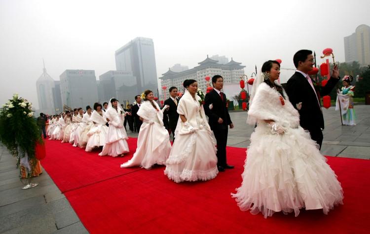 <a><img src="https://www.theepochtimes.com/assets/uploads/2015/09/77531259.jpg" alt="China's new marriage law amendment is controversial for favoring men and not protecting women by law.  (AFP/Getty Images)" title="China's new marriage law amendment is controversial for favoring men and not protecting women by law.  (AFP/Getty Images)" width="320" class="size-medium wp-image-1798736"/></a>