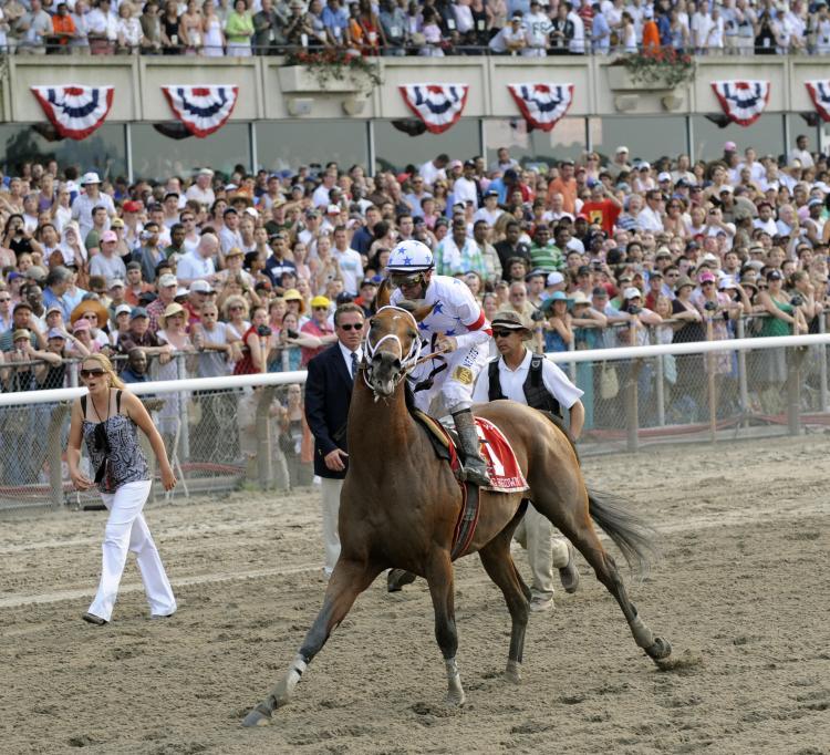 <a><img src="https://www.theepochtimes.com/assets/uploads/2015/09/81488416.jpg" alt="Track workers come to help Big Brown after he failed to finish the Belmont Stakes on June 7. A firestorm of controversy over the use of drugs in horse racing has since erupted. (Timothy A. Clary/AFP/Getty Images)" title="Track workers come to help Big Brown after he failed to finish the Belmont Stakes on June 7. A firestorm of controversy over the use of drugs in horse racing has since erupted. (Timothy A. Clary/AFP/Getty Images)" width="320" class="size-medium wp-image-1834805"/></a>