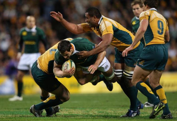 <a><img src="https://www.theepochtimes.com/assets/uploads/2015/09/81999512.jpg" alt="Pierre Spies of the South African Springboks gets tackled by the Australian Wallabies in the third of the Tri-Nations nine-match series. (Cameron Spencer/Getty Images)" title="Pierre Spies of the South African Springboks gets tackled by the Australian Wallabies in the third of the Tri-Nations nine-match series. (Cameron Spencer/Getty Images)" width="320" class="size-medium wp-image-1834107"/></a>