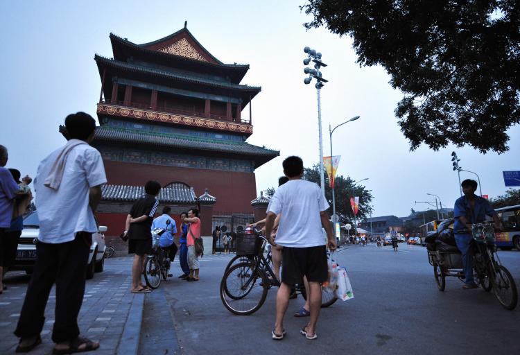 <a><img src="https://www.theepochtimes.com/assets/uploads/2015/09/82230159Drum.jpg" alt="People gather outside Beijing's ancient Drum Tower on August 9, 2008 in Beijing, where a relative of a US Olympic coach was killed and another injured in a stabbing attack earlier in the day. (Frederic J. Brown/AFP/Getty Images)" title="People gather outside Beijing's ancient Drum Tower on August 9, 2008 in Beijing, where a relative of a US Olympic coach was killed and another injured in a stabbing attack earlier in the day. (Frederic J. Brown/AFP/Getty Images)" width="320" class="size-medium wp-image-1834222"/></a>