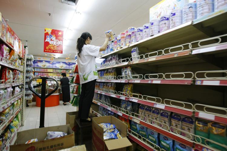 <a><img src="https://www.theepochtimes.com/assets/uploads/2015/09/82852633scandal.jpg" alt="A worker removes melamine-tainted milk powder from the shelf in a supermarket in September in Beijing, China. All the major brands are affected. (China Photos/Getty Images)" title="A worker removes melamine-tainted milk powder from the shelf in a supermarket in September in Beijing, China. All the major brands are affected. (China Photos/Getty Images)" width="320" class="size-medium wp-image-1833233"/></a>