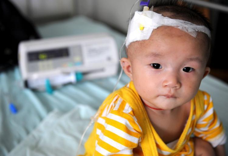<a><img src="https://www.theepochtimes.com/assets/uploads/2015/09/82944388.jpg" alt="A baby who suffers from kidney stones after drinking tainted milk powder gets IV treatment at a hospital.  (China Photos/Getty Images)" title="A baby who suffers from kidney stones after drinking tainted milk powder gets IV treatment at a hospital.  (China Photos/Getty Images)" width="320" class="size-medium wp-image-1833534"/></a>