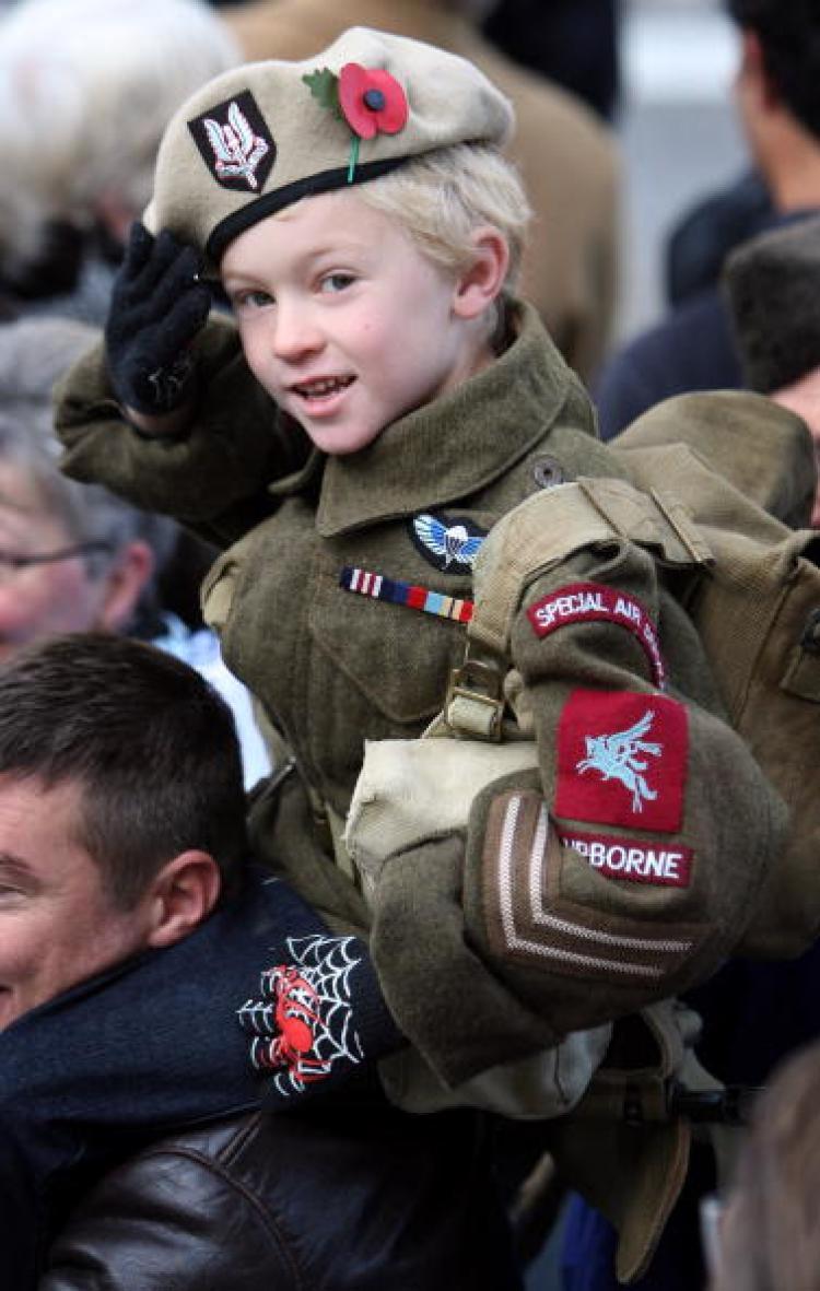 <a><img src="https://www.theepochtimes.com/assets/uploads/2015/09/83619336.jpg" alt="Alfie Amos, 6, wears a World War II SAS uniform as he salutes at the Remembrance Sunday Service at the Cenotaph on November 9, 2008 in London. (Chris Jackson/Getty Images)" title="Alfie Amos, 6, wears a World War II SAS uniform as he salutes at the Remembrance Sunday Service at the Cenotaph on November 9, 2008 in London. (Chris Jackson/Getty Images)" width="320" class="size-medium wp-image-1804801"/></a>