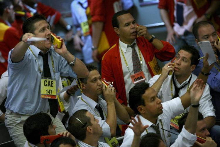 <a><img src="https://www.theepochtimes.com/assets/uploads/2015/09/85770057Brazil.jpg" alt="Stock traders in the iBovespa future index pit at the Mercantile and Futures Exchange (BM&F), in Sao Paulo, Brazil. (Mauricio Lima/AFP/Getty Images)" title="Stock traders in the iBovespa future index pit at the Mercantile and Futures Exchange (BM&F), in Sao Paulo, Brazil. (Mauricio Lima/AFP/Getty Images)" width="320" class="size-medium wp-image-1828548"/></a>