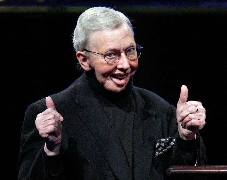 <a><img src="https://www.theepochtimes.com/assets/uploads/2015/09/85777756.jpg" alt="Roger Ebert accepts the ShoWest Career Achievement in Film Journalism Award at the Paris Las Vegas during ShoWest on April 2, 2009 in Las Vegas, Nevada.  (Ethan Miller/Getty Images)" title="Roger Ebert accepts the ShoWest Career Achievement in Film Journalism Award at the Paris Las Vegas during ShoWest on April 2, 2009 in Las Vegas, Nevada.  (Ethan Miller/Getty Images)" width="320" class="size-medium wp-image-1808453"/></a>