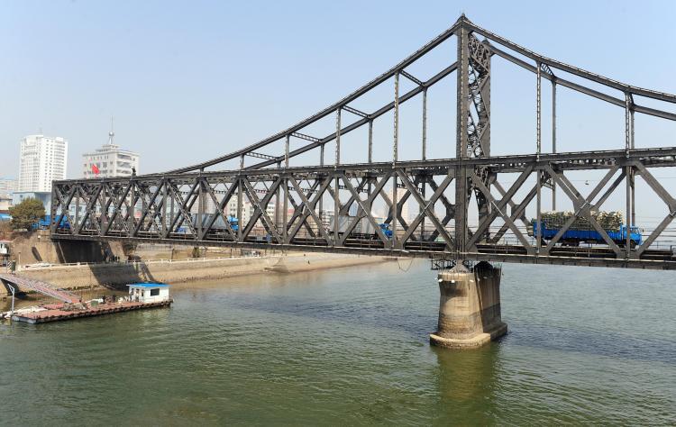 <a><img src="https://www.theepochtimes.com/assets/uploads/2015/09/85830564Border.jpg" alt="The Sino-Korean Friendship Bridge in Dandong, Liaoning province across the Yalu River to the North Korean border town of Sinuiju. (Frederic J. Brown/AFP/Getty Images)" title="The Sino-Korean Friendship Bridge in Dandong, Liaoning province across the Yalu River to the North Korean border town of Sinuiju. (Frederic J. Brown/AFP/Getty Images)" width="320" class="size-medium wp-image-1825821"/></a>