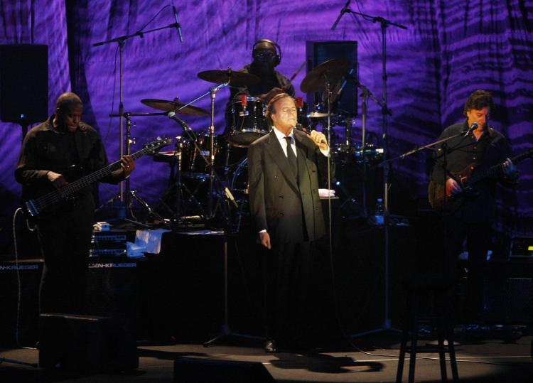 <a><img src="https://www.theepochtimes.com/assets/uploads/2015/09/85916961.jpg" alt="Spanish singer Julio Iglesias performs on stage during a concert in downtown Beirut in 2009. (RAMZI HAIDAR/AFP/Getty Images)" title="Spanish singer Julio Iglesias performs on stage during a concert in downtown Beirut in 2009. (RAMZI HAIDAR/AFP/Getty Images)" width="320" class="size-medium wp-image-1815469"/></a>