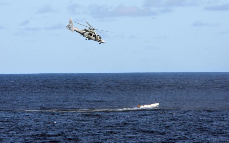 <a><img src="https://www.theepochtimes.com/assets/uploads/2015/09/86357415.jpg" alt="A French Navy 'Panther' helicopter chases a boat carrying suspected Somali pirates off the French warship 'Le Nivose', as part of European Union's anti-piracy naval mission. (Pierre Verdy/AFP/Getty Images)" title="A French Navy 'Panther' helicopter chases a boat carrying suspected Somali pirates off the French warship 'Le Nivose', as part of European Union's anti-piracy naval mission. (Pierre Verdy/AFP/Getty Images)" width="320" class="size-medium wp-image-1822274"/></a>
