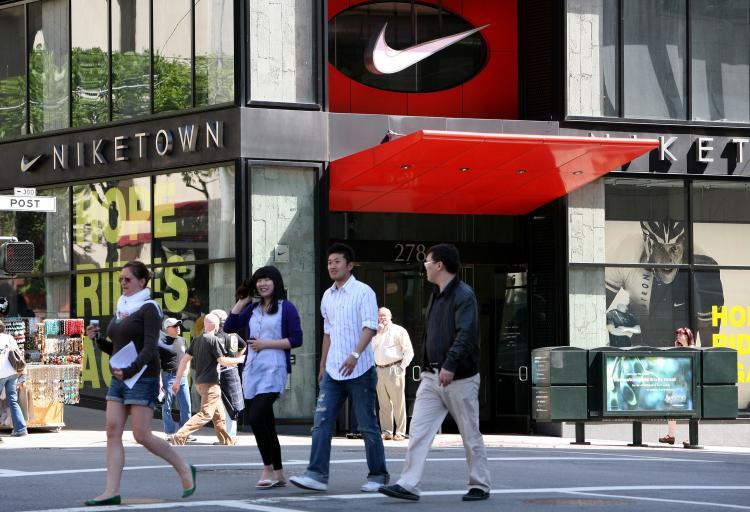 <a><img src="https://www.theepochtimes.com/assets/uploads/2015/09/87249840.jpg" alt="Pedestrians walk by a NikeTown store May 15, 2009 in San Francisco, California. In 2009, 56 percent of mainland Chinese's luxury purchases were made abroad (including Hong Kong and Macau), amounting to 87 billion yuan, or US$13.4 billion.   (Justin Sullivan/Getty Images)" title="Pedestrians walk by a NikeTown store May 15, 2009 in San Francisco, California. In 2009, 56 percent of mainland Chinese's luxury purchases were made abroad (including Hong Kong and Macau), amounting to 87 billion yuan, or US$13.4 billion.   (Justin Sullivan/Getty Images)" width="320" class="size-medium wp-image-1804760"/></a>
