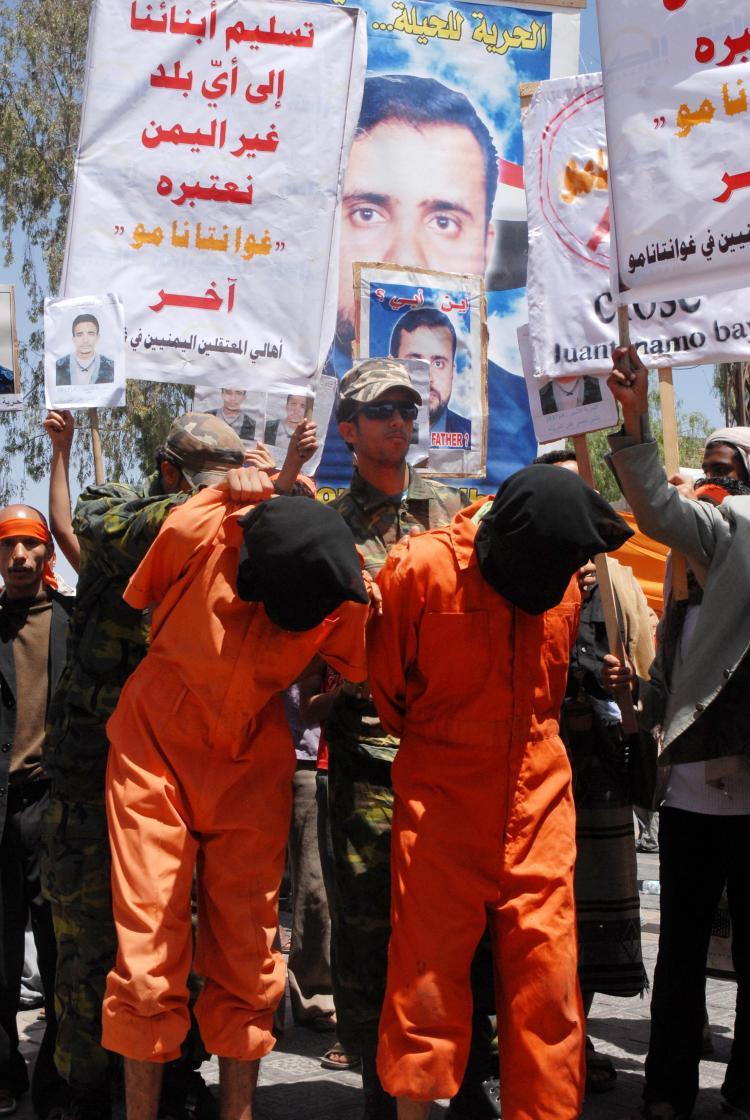 <a><img src="https://www.theepochtimes.com/assets/uploads/2015/09/87979101.jpg" alt="Yemenis dressed in orange jumpsuits and army camouflage protest in Sanaa on May 26, 2009, calling on the Yemeni government to step up efforts in order to free relatives held at the controversial U.S. Guantanamo Bay prison. (Khaled Fazaa/AFP/Getty Images)" title="Yemenis dressed in orange jumpsuits and army camouflage protest in Sanaa on May 26, 2009, calling on the Yemeni government to step up efforts in order to free relatives held at the controversial U.S. Guantanamo Bay prison. (Khaled Fazaa/AFP/Getty Images)" width="320" class="size-medium wp-image-1824202"/></a>