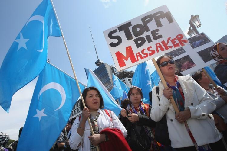<a><img class="size-large wp-image-1785426" title="Uighurs Protest In Front Of Chinese Embassy" src="https://www.theepochtimes.com/assets/uploads/2015/09/889650001.jpg" alt="" width="590" height="393"/></a>