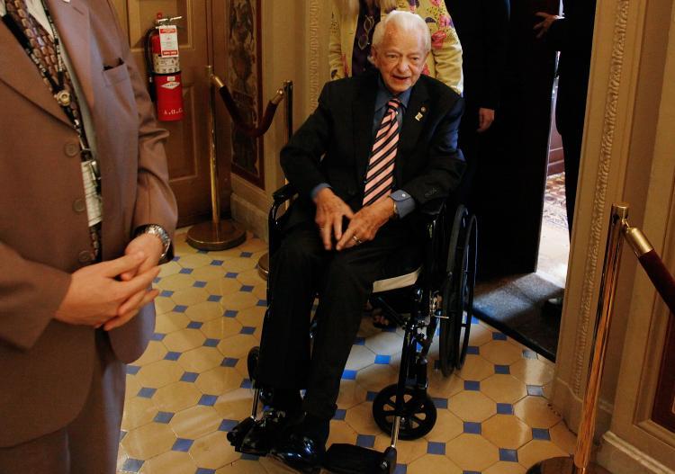 <a><img src="https://www.theepochtimes.com/assets/uploads/2015/09/89636956.jpg" alt="Sen. Robert C. Byrd (D-WV) sits in a wheelchair as he is brought to the Senate floor to vote on judge Sonia Sotomayor, on Capitol Hill August 6, 2009 in Washington, DC. (Mark Wilson/Getty Images)" title="Sen. Robert C. Byrd (D-WV) sits in a wheelchair as he is brought to the Senate floor to vote on judge Sonia Sotomayor, on Capitol Hill August 6, 2009 in Washington, DC. (Mark Wilson/Getty Images)" width="320" class="size-medium wp-image-1818046"/></a>