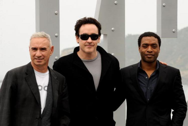 <a><img src="https://www.theepochtimes.com/assets/uploads/2015/09/91113754.jpg" alt="Director Roland Emmerich, actor John Cusack and actor Chiwetel Ejiofor attend '2012' photocall at the Kursaal Palace during the 57th San Sebastian International Film Festival on September 24, 2009. (Carlos Alvarez/Getty Images)" title="Director Roland Emmerich, actor John Cusack and actor Chiwetel Ejiofor attend '2012' photocall at the Kursaal Palace during the 57th San Sebastian International Film Festival on September 24, 2009. (Carlos Alvarez/Getty Images)" width="320" class="size-medium wp-image-1825677"/></a>