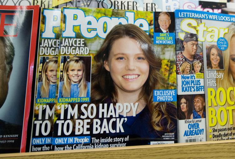 <a><img src="https://www.theepochtimes.com/assets/uploads/2015/09/92345871.jpg" alt="People Magazine's October 26 issue with recently freed kidnapping victim Jaycee Dugard on the cover, appears on a newstand in Washington on October 16, 2009. (Saul Loeb/AFP/Getty Images)" title="People Magazine's October 26 issue with recently freed kidnapping victim Jaycee Dugard on the cover, appears on a newstand in Washington on October 16, 2009. (Saul Loeb/AFP/Getty Images)" width="320" class="size-medium wp-image-1817863"/></a>