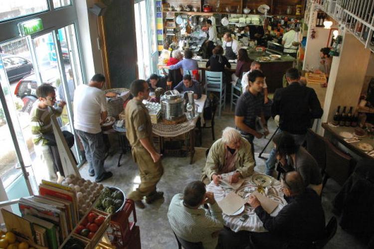 <a><img src="https://www.theepochtimes.com/assets/uploads/2015/09/93493960.jpg" alt="Israeli and foreigners eat at a busy 'MahneYuda', a recently opened gourmet non-Kosher restaurant, in Jerusalem's landmark Mahne Yehuda market. (Marina Passos /Getty Images)" title="Israeli and foreigners eat at a busy 'MahneYuda', a recently opened gourmet non-Kosher restaurant, in Jerusalem's landmark Mahne Yehuda market. (Marina Passos /Getty Images)" width="320" class="size-medium wp-image-1817261"/></a>