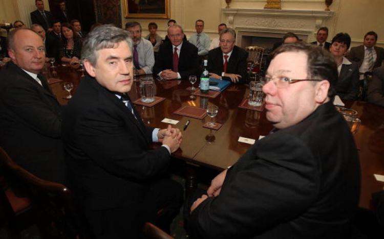 <a><img src="https://www.theepochtimes.com/assets/uploads/2015/09/96202469.jpg" alt="Britain's Prime Minister Gordon Brown sits beside his Irish counterpart Brian Cowen at a plenary session with the British and Irish governments at Hillsborough Castle in Belfast on Jan. 26.  (Paul Faith/WPA Pool/Getty Images)" title="Britain's Prime Minister Gordon Brown sits beside his Irish counterpart Brian Cowen at a plenary session with the British and Irish governments at Hillsborough Castle in Belfast on Jan. 26.  (Paul Faith/WPA Pool/Getty Images)" width="320" class="size-medium wp-image-1823626"/></a>