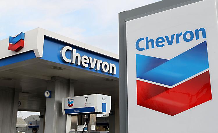 <a><img class="size-full wp-image-1791203" src="https://www.theepochtimes.com/assets/uploads/2015/09/96263538_Chevron.jpg" alt="The Chevron logo is displayed at a Chevron gas station" width="328"/></a>