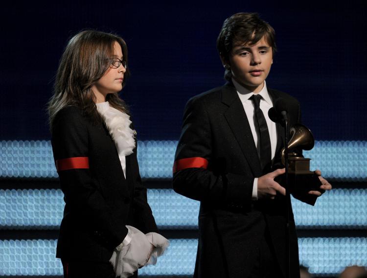 <a><img src="https://www.theepochtimes.com/assets/uploads/2015/09/96308644.jpg" alt="Paris Jackson (L) and Prince Michael Jackson accept the Lifetime Achievement award for Michael Jackson during the 52nd Annual GRAMMY Awards on January 31 in California. (Kevin Winter/Getty Images)" title="Paris Jackson (L) and Prince Michael Jackson accept the Lifetime Achievement award for Michael Jackson during the 52nd Annual GRAMMY Awards on January 31 in California. (Kevin Winter/Getty Images)" width="320" class="size-medium wp-image-1815477"/></a>