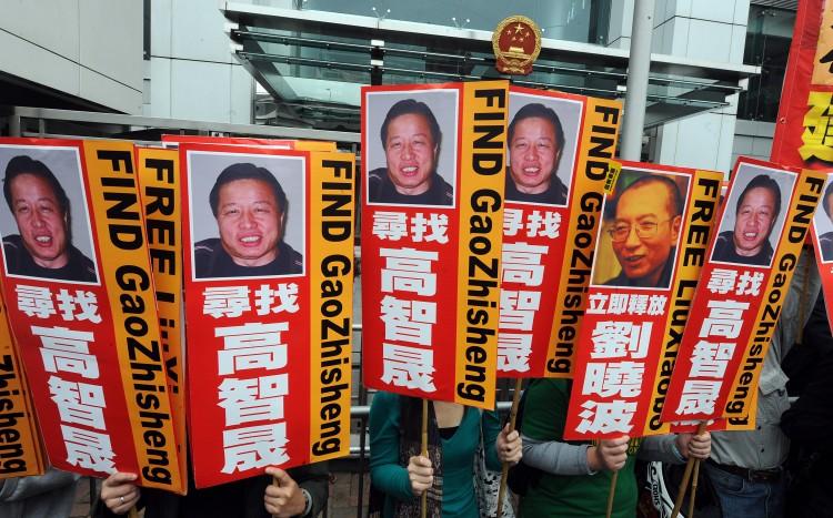 <a><img src="https://www.theepochtimes.com/assets/uploads/2015/09/96401898.jpg" alt="Members of a lawyers concern group hold banners in protest for the release of Beijing human rights rights lawyer Gao Zhisheng and dissident critic Liu Xiaobo outside the China Liaison office in Hong Kong on February 4, 2010 in this file photo.  (Mike Clarke/Getty Images)" title="Members of a lawyers concern group hold banners in protest for the release of Beijing human rights rights lawyer Gao Zhisheng and dissident critic Liu Xiaobo outside the China Liaison office in Hong Kong on February 4, 2010 in this file photo.  (Mike Clarke/Getty Images)" width="325" class="size-medium wp-image-1799319"/></a>