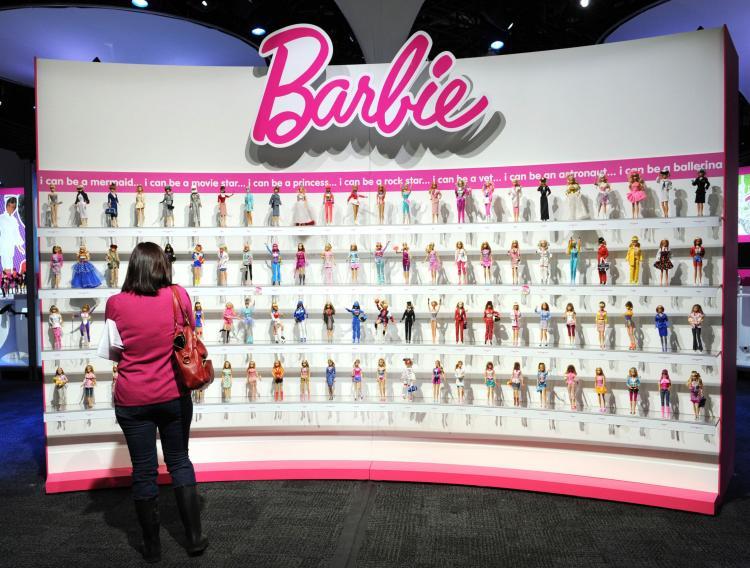<a><img src="https://www.theepochtimes.com/assets/uploads/2015/09/96691734Mattel.jpg" alt="A wall of Barbie dolls in the Mattel display at the annual Toy Fair, February 14, 2010 in New York. (Stan Honda/AFP/Getty Images)" title="A wall of Barbie dolls in the Mattel display at the annual Toy Fair, February 14, 2010 in New York. (Stan Honda/AFP/Getty Images)" width="320" class="size-medium wp-image-1820959"/></a>