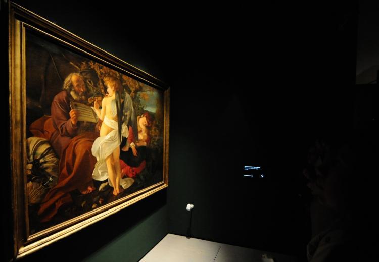 <a><img src="https://www.theepochtimes.com/assets/uploads/2015/09/96865082.jpg" alt="A view of a painting by Italian master Caravaggio on February 19, 2010 on the eve of the opening of Caravaggio, an exhibition running from February 20 to June 13, 2010 at the Scuderie del Quirinale in Rome. (Christophe Simon/AFP/Getty Images)" title="A view of a painting by Italian master Caravaggio on February 19, 2010 on the eve of the opening of Caravaggio, an exhibition running from February 20 to June 13, 2010 at the Scuderie del Quirinale in Rome. (Christophe Simon/AFP/Getty Images)" width="320" class="size-medium wp-image-1817914"/></a>