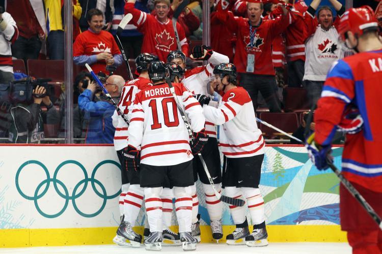 <a><img src="https://www.theepochtimes.com/assets/uploads/2015/09/97032409.jpg" alt="Ryan Getzlaf of Canada celebrates with his team after scoring a goal against Evgeny Nabokov of Russia during the ice hockey men's quarter final game between Russia and Canada on day 13 of the Vancouver 2010 Winter Olympics at Canada Hockey Place on Februa (Cameron Spencer/Getty Images)" title="Ryan Getzlaf of Canada celebrates with his team after scoring a goal against Evgeny Nabokov of Russia during the ice hockey men's quarter final game between Russia and Canada on day 13 of the Vancouver 2010 Winter Olympics at Canada Hockey Place on Februa (Cameron Spencer/Getty Images)" width="320" class="size-medium wp-image-1822682"/></a>