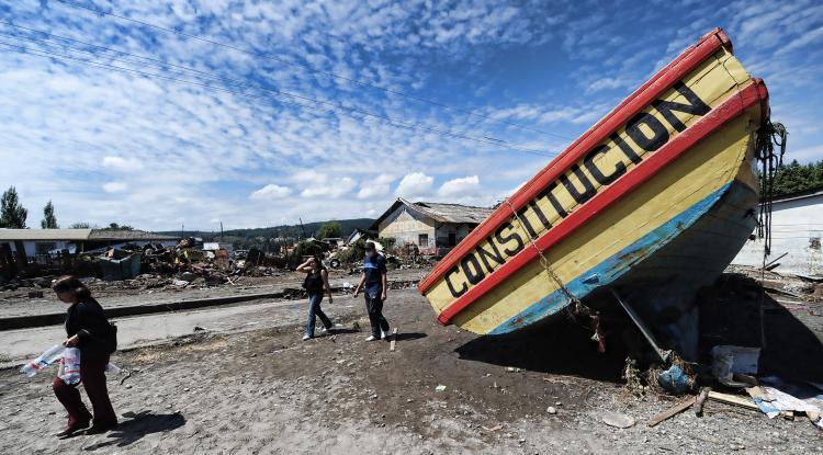 <a><img src="https://www.theepochtimes.com/assets/uploads/2015/09/97370707.jpg" alt="A boat grounded by the tsunami March 2, 2010 in the fishing village of Constitucion, central Chile. (Martin Bernetti/AFP/Getty Images)" title="A boat grounded by the tsunami March 2, 2010 in the fishing village of Constitucion, central Chile. (Martin Bernetti/AFP/Getty Images)" width="320" class="size-medium wp-image-1822500"/></a>